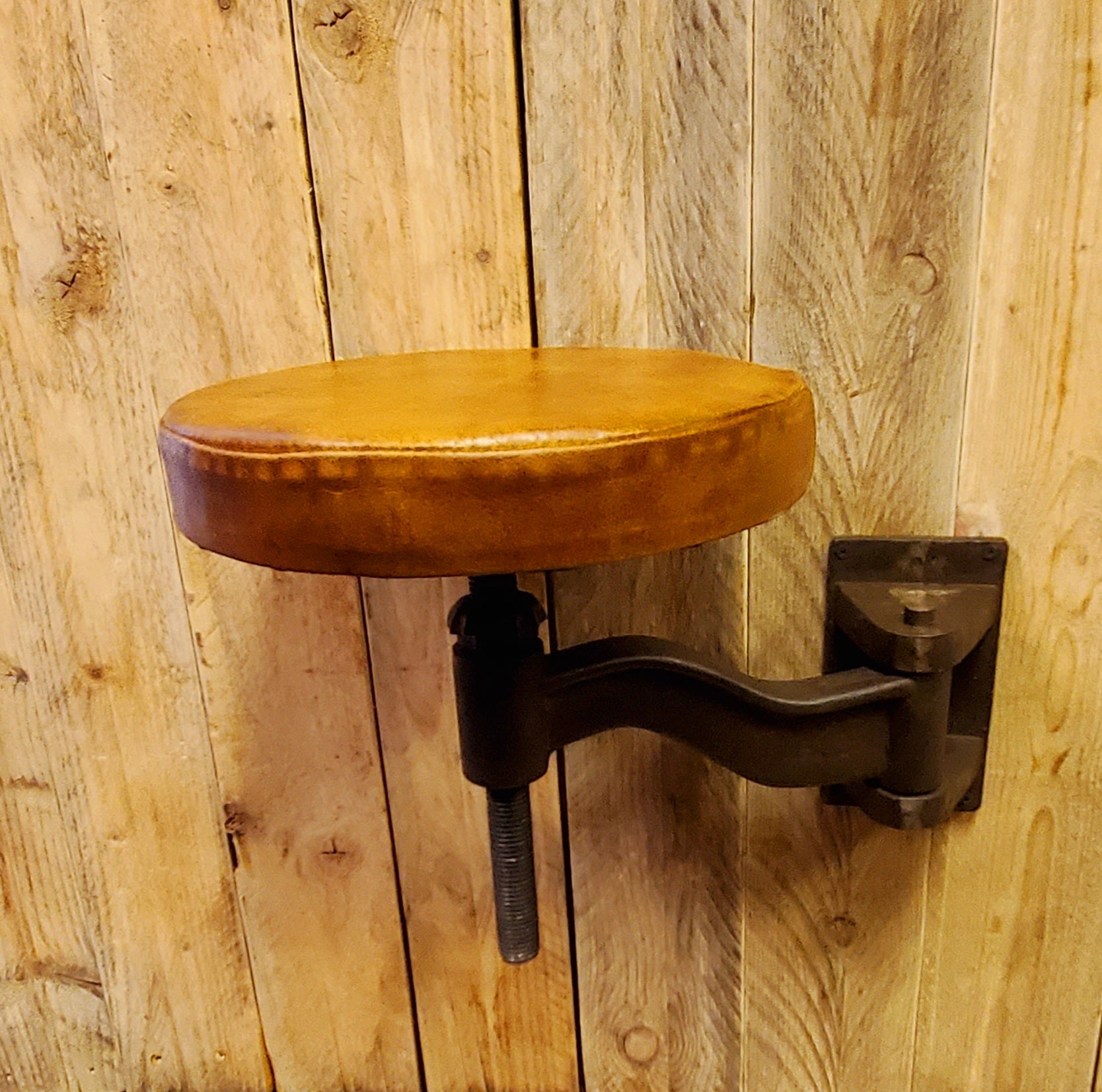 Wall mount store bar stool